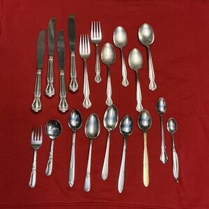 Mismatched pieces of silverware. Nineteen (19) total